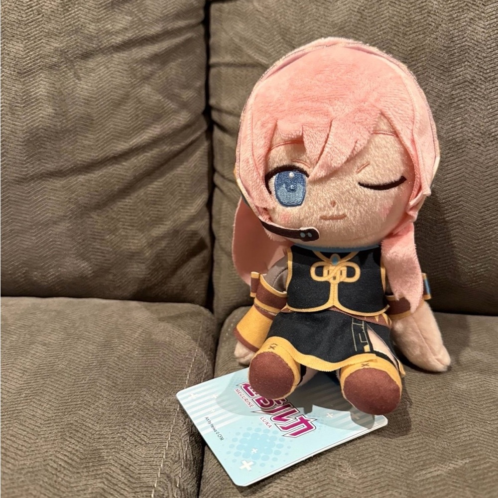 Pink Plush Character Stuffed Animal - Cute Winking Design